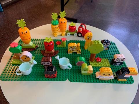 Little Duplo's displayed on table.