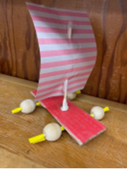 Example of wind-powered toy car with a paper sail