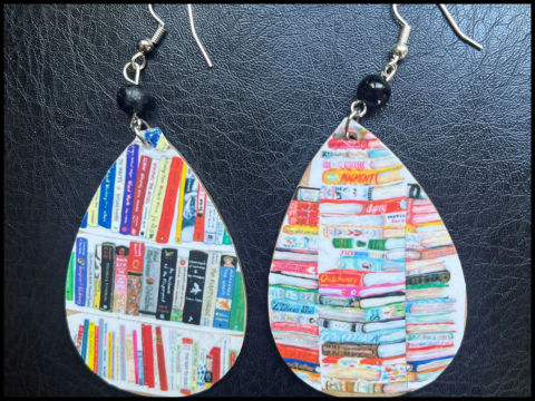 Earrings with book images on them.