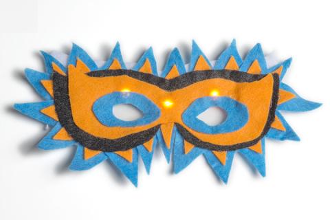 An illuminated, felt mask.