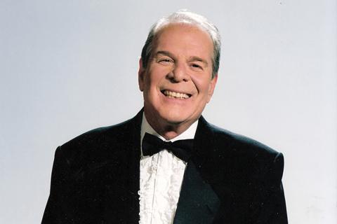 Photo of Richard Lederer wearing a tuxedo