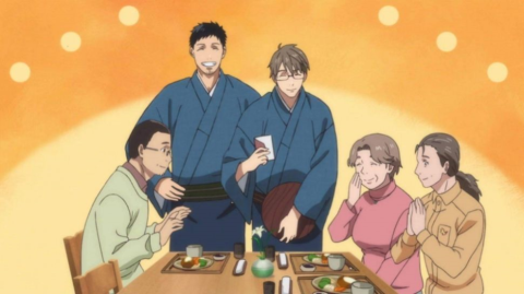 three young men and two young women sitting and talking about manga