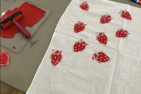 relief print of strawberries