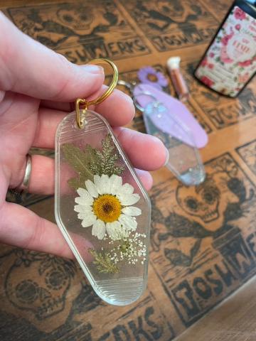 sample of pressed flower resin keychain