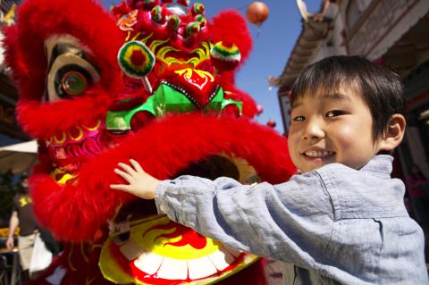 Child with a Chinese dragon