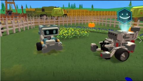 Two robots on green grass on a farm.