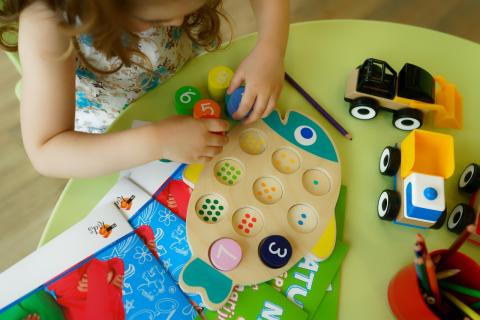 Child playing at table