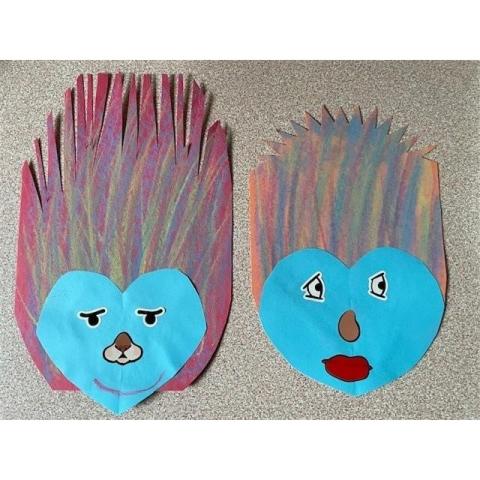 Porcupine faces made of paper with chalk decorated quills