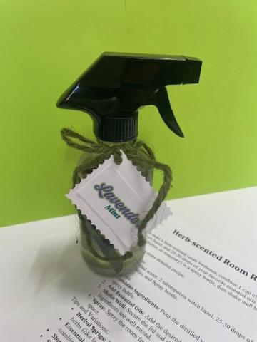 Small spray bottle filled with room refresher.