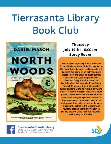 A lion lying in a green pasture