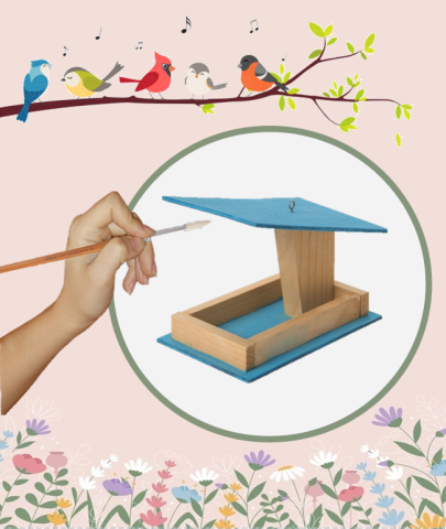 Wood bird feeder with hand holding a paint brush