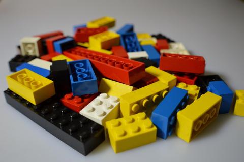 lego bricks of different colors in assorted pile