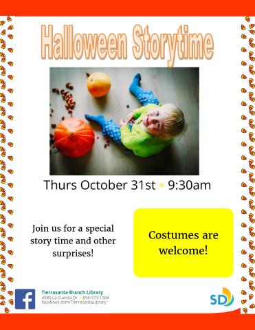 little boy surrounded by pumpkins