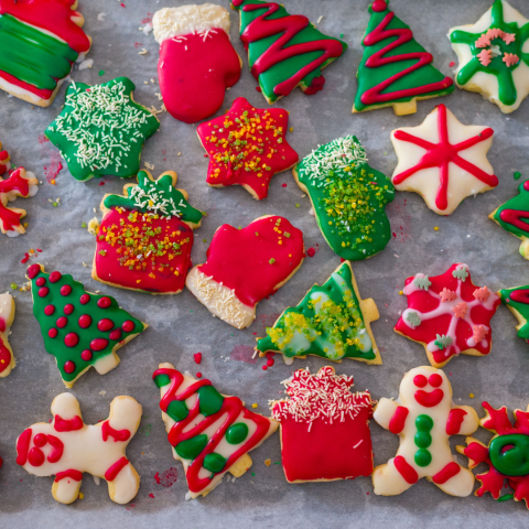 display of holiday cookies frosted in green and red