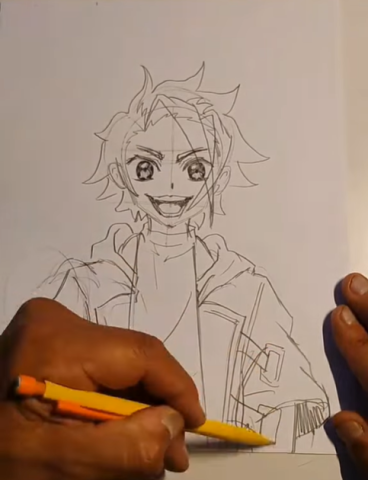 Artist drawing an anime character on a piece of paper.