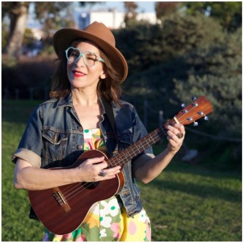 Woman playing guitar