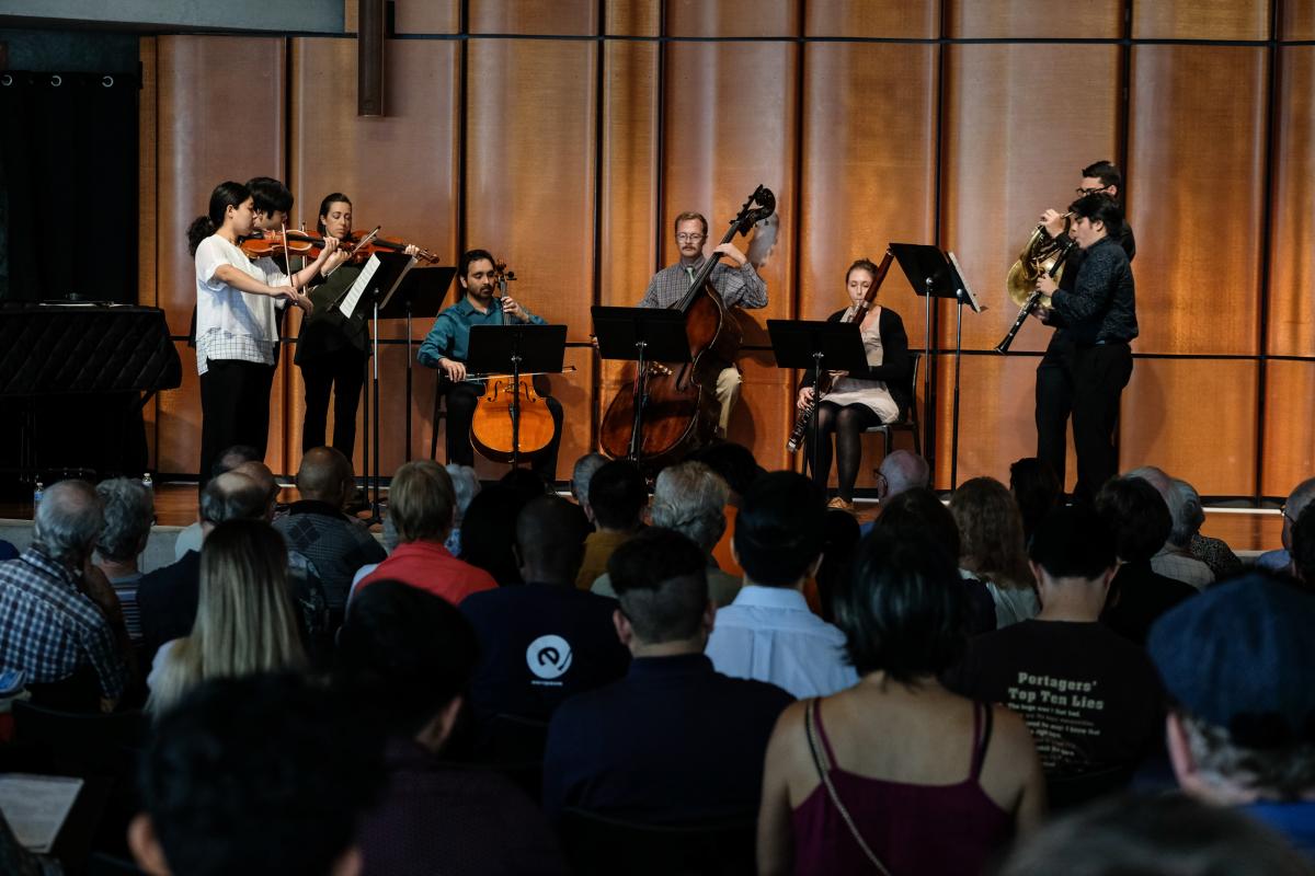 SDSU Undergraduate and graduate students performing a concert on stage