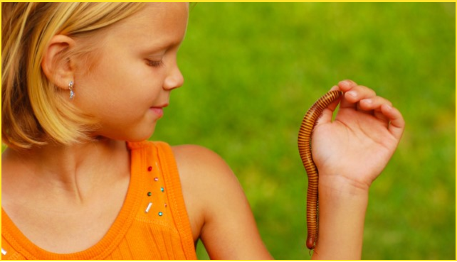 Girl with worm on hand