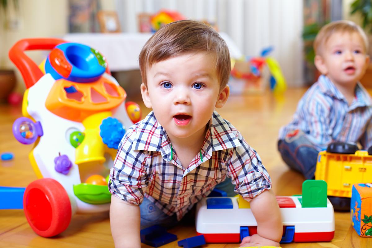 Babies with toys