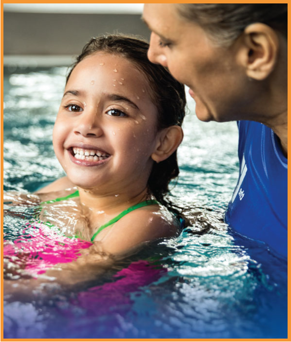 Young girl and woman in swimming pool