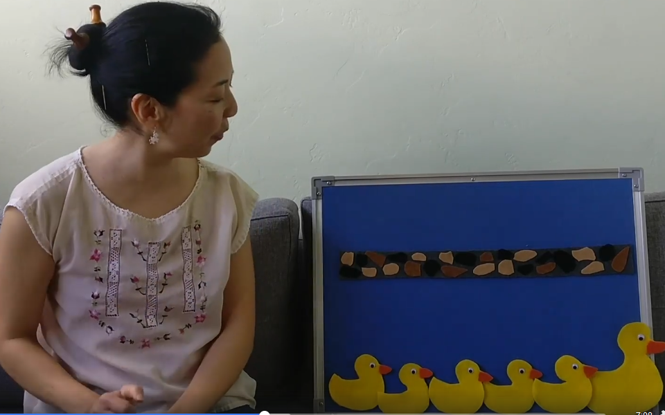 Photo of librarian with felt board