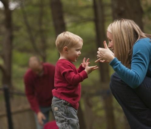 Woman signing to son