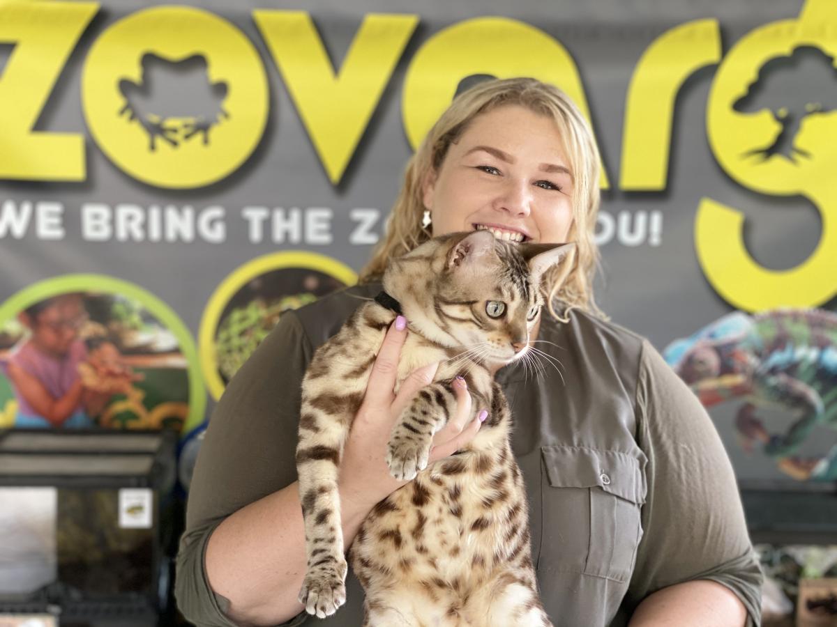 Zovargo host holding a Bengal Cat.
