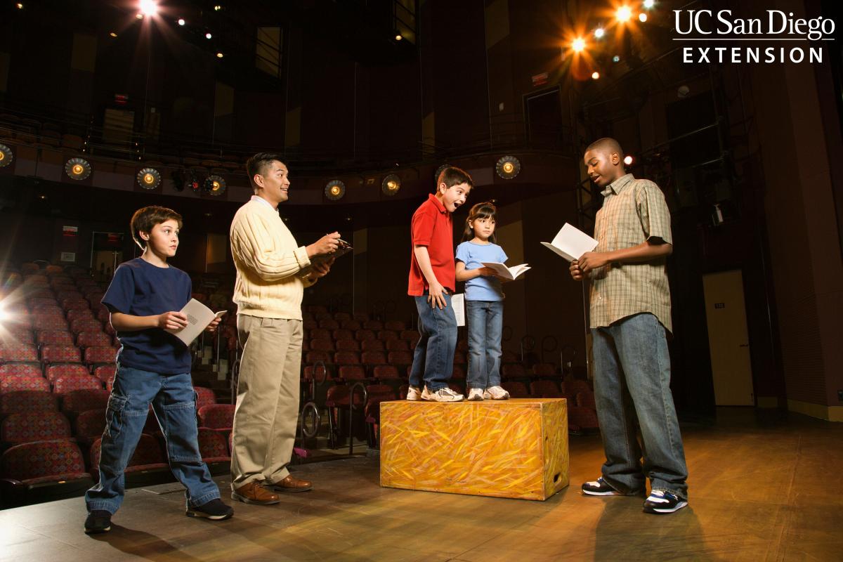 students on practicing for play on stage