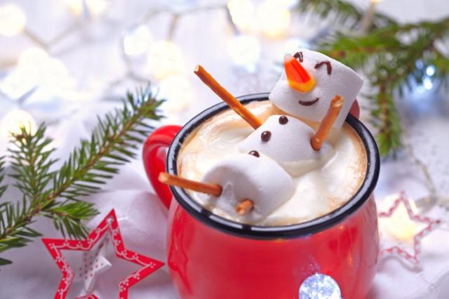 marshmallow snowman in cup of hot chocolate