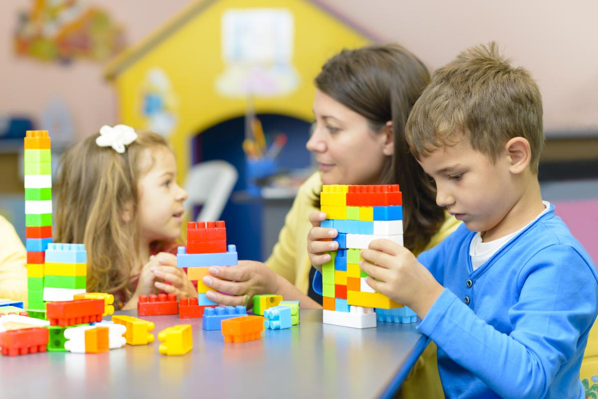 Family playing with lego