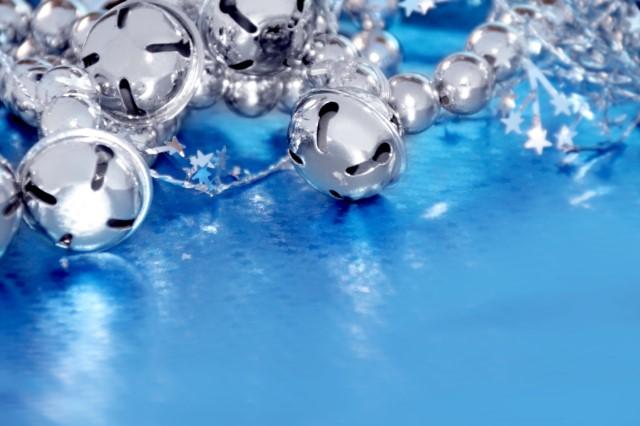 Blue background with silver jingle bells