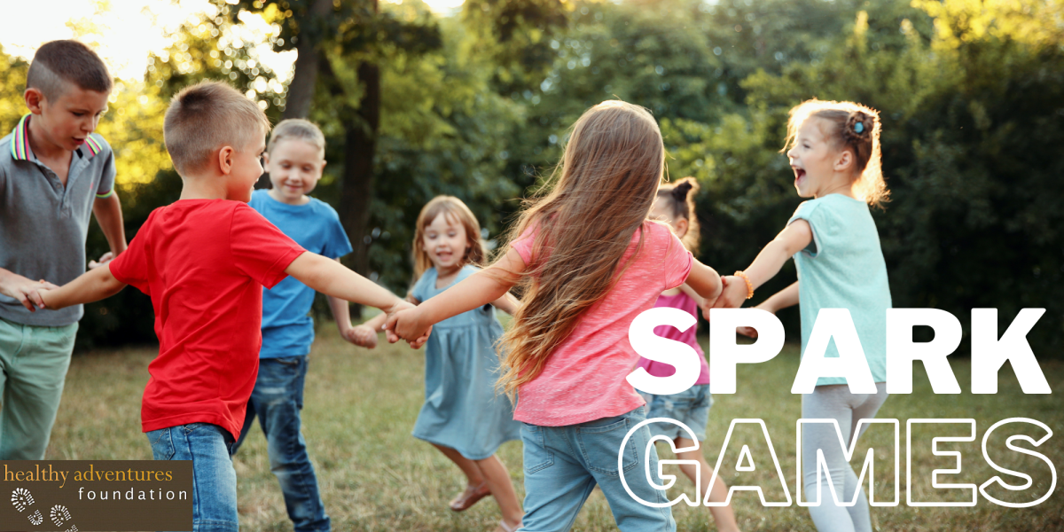 Kids spinning around in a big circle