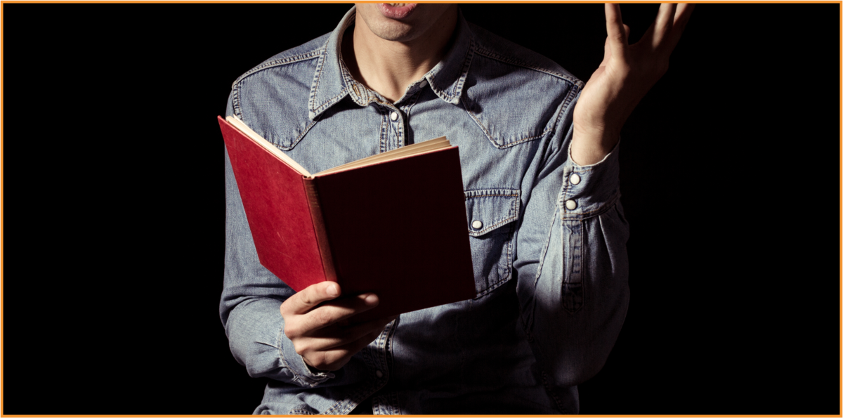 Person reading aloud from a book