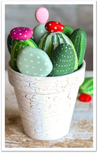 Rocks painted as cactus.