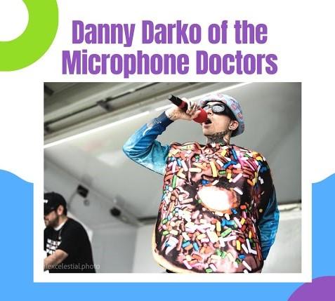 Man singing while wearing a donut costume.