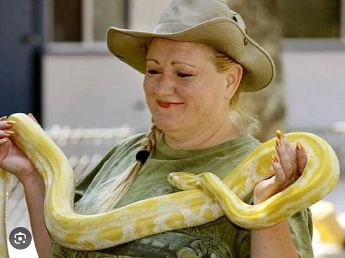 Woman with albino python