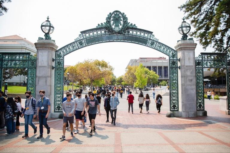 Students walking through Sather Gate at UC Berkeley