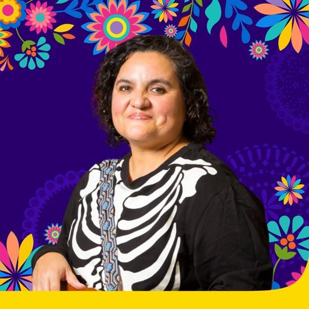 Ms. Jackie with a Día de los Muertos background