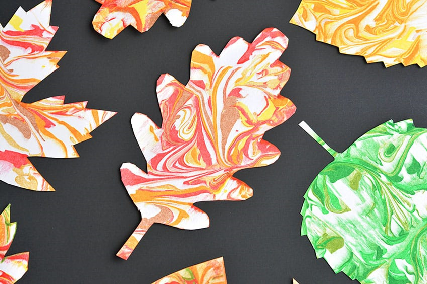 Painted paper leaves with a marbled design