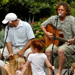 Music group Hullabaloo performing with children dancing
